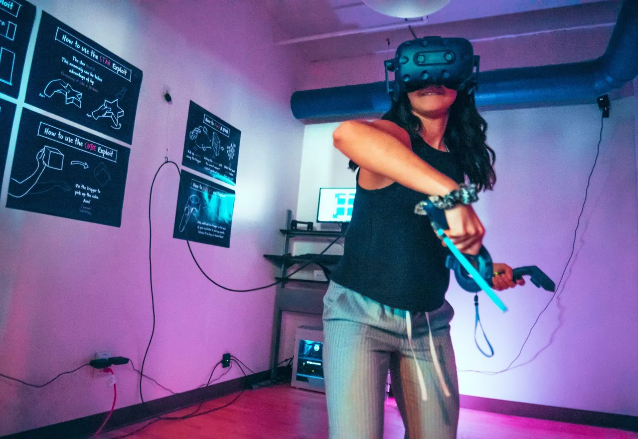 A woman wearing a VR headset in action